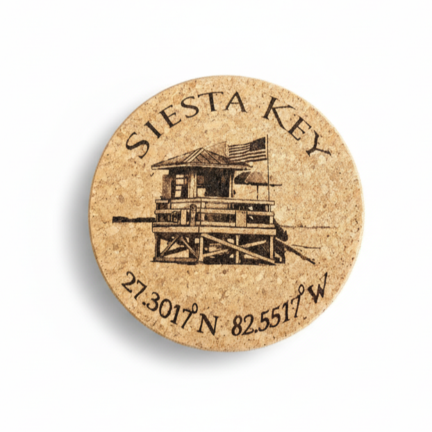 Round Cork coaster with 'Siesta Key' Laser Engraved and coordinates on a white background