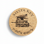 Round Cork coaster with 'Siesta Key' Laser Engraved and coordinates on a white background