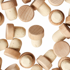 Wooden bottle caps scattered on a white background with a visible brand logo.